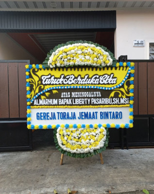 Papan Bunga Duka di Sengkerang